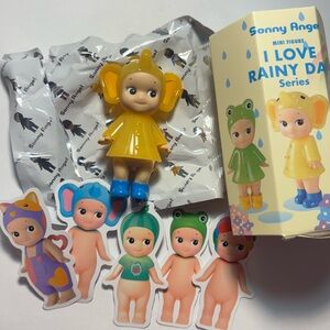 I Love Rainy Day Sonny Angel Figure - Yellow and Blue Elephant + Sticker bundle